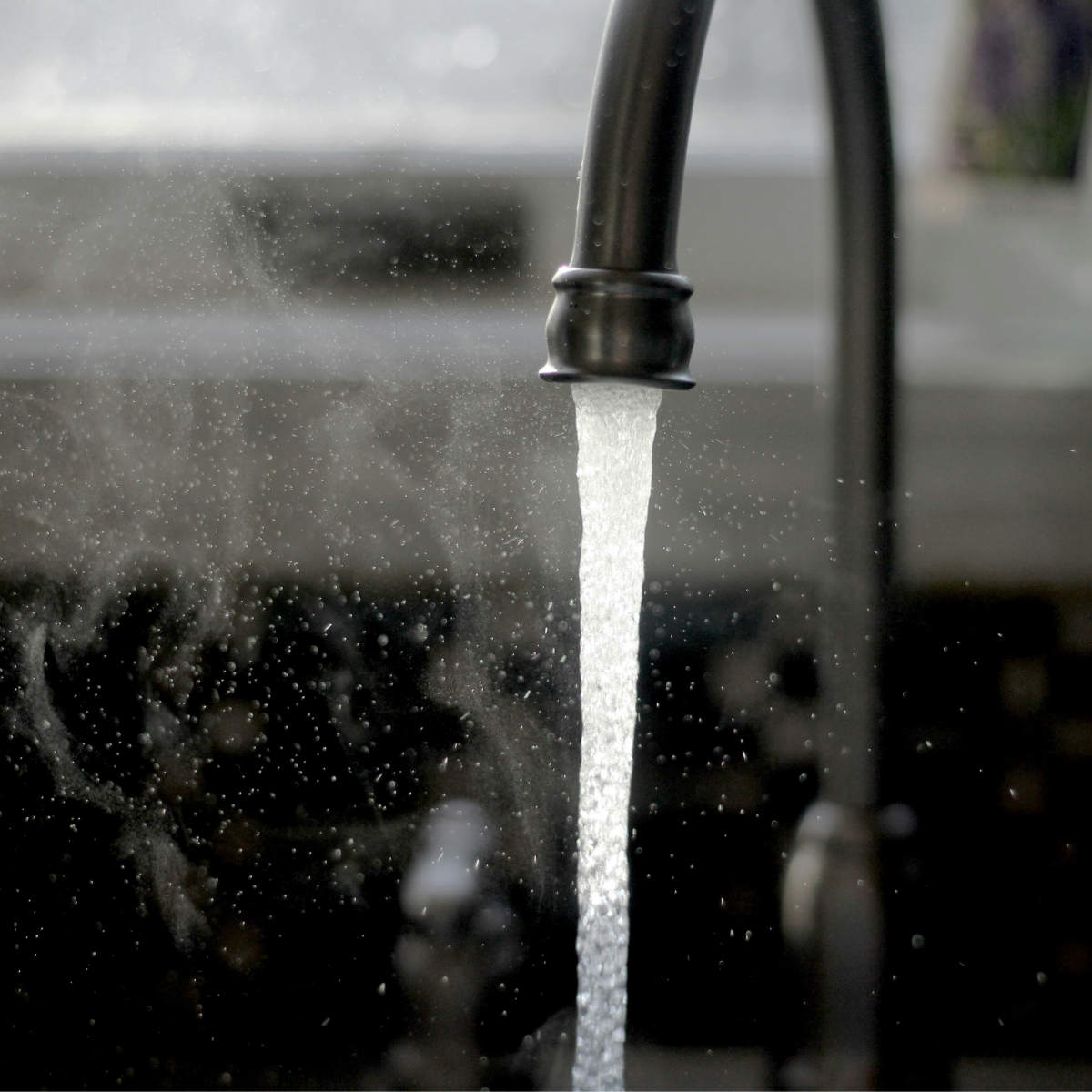 image of running kitchen faucet